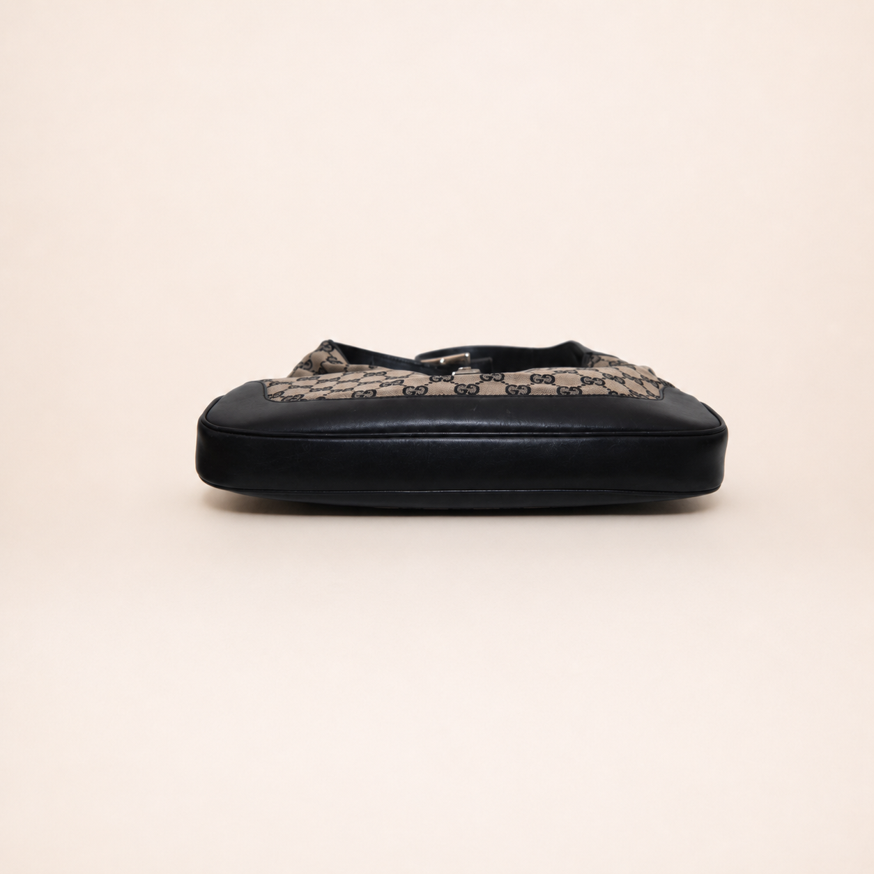 Authentic vintage Gucci Jackie O handbag in beige GG canvas with black leather trim and gold-tone hardware
