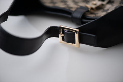 Authentic vintage Gucci Jackie O handbag in beige GG canvas with black leather trim and gold-tone hardware