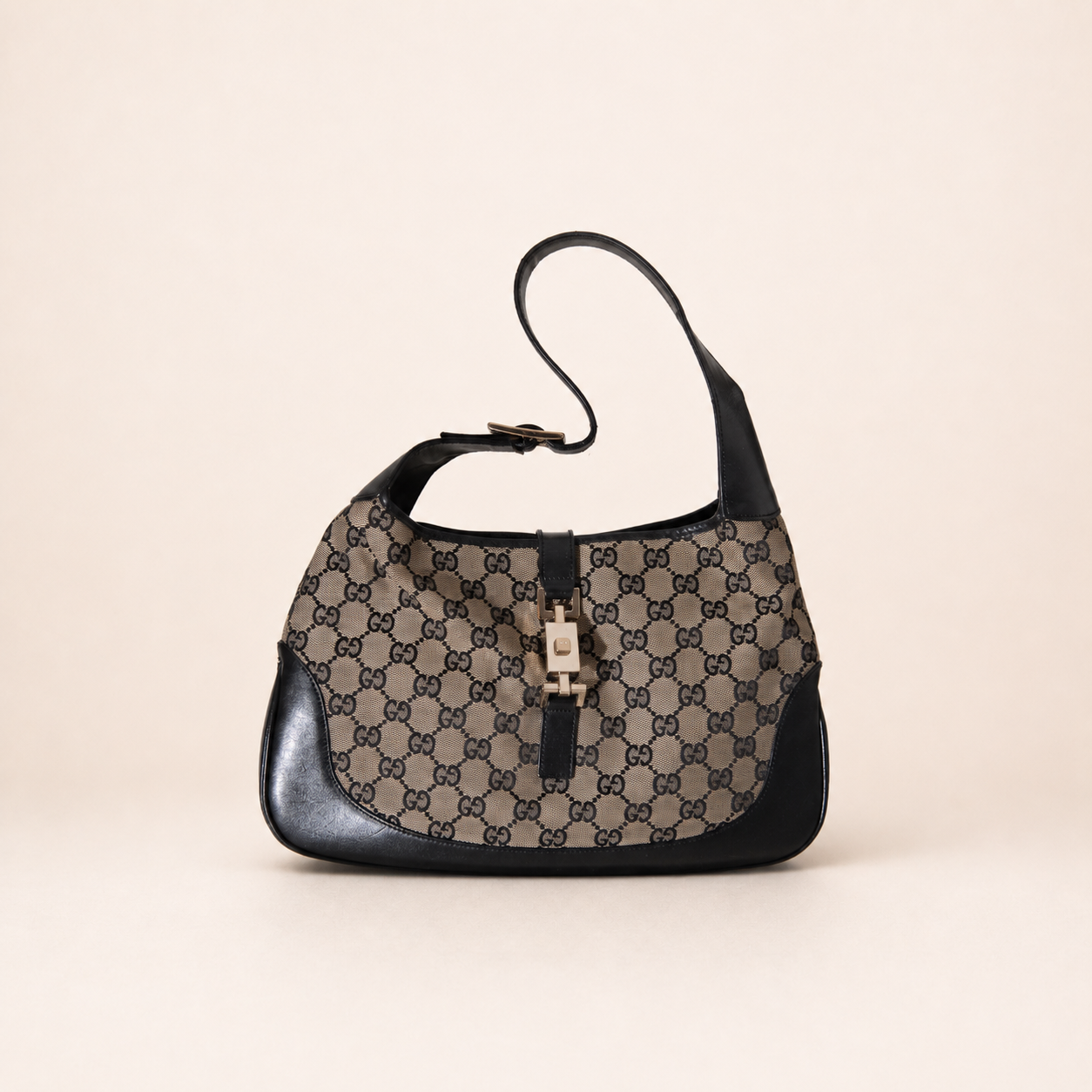 Authentic vintage Gucci Jackie O handbag in beige GG canvas with black leather trim and gold-tone hardware