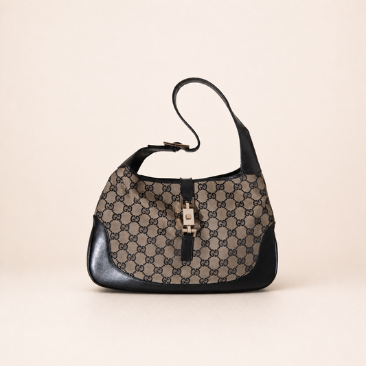 Authentic vintage Gucci Jackie O handbag in beige GG canvas with black leather trim and gold-tone hardware