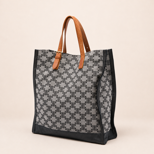 Authentic vintage Céline Triomphe Vertical Tote bag in grey Triomphe canvas with leather trim, tan leather handles and a detachable shoulder strap.
