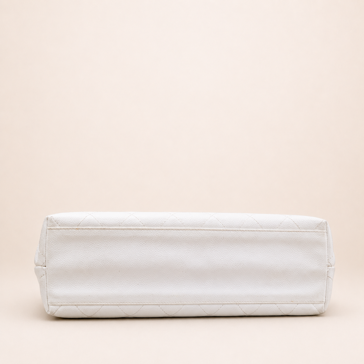 Rare authentic Chanel White Caviar Leather Wood Handle Bag with Matelassé quilting and gold-tone CC logo.