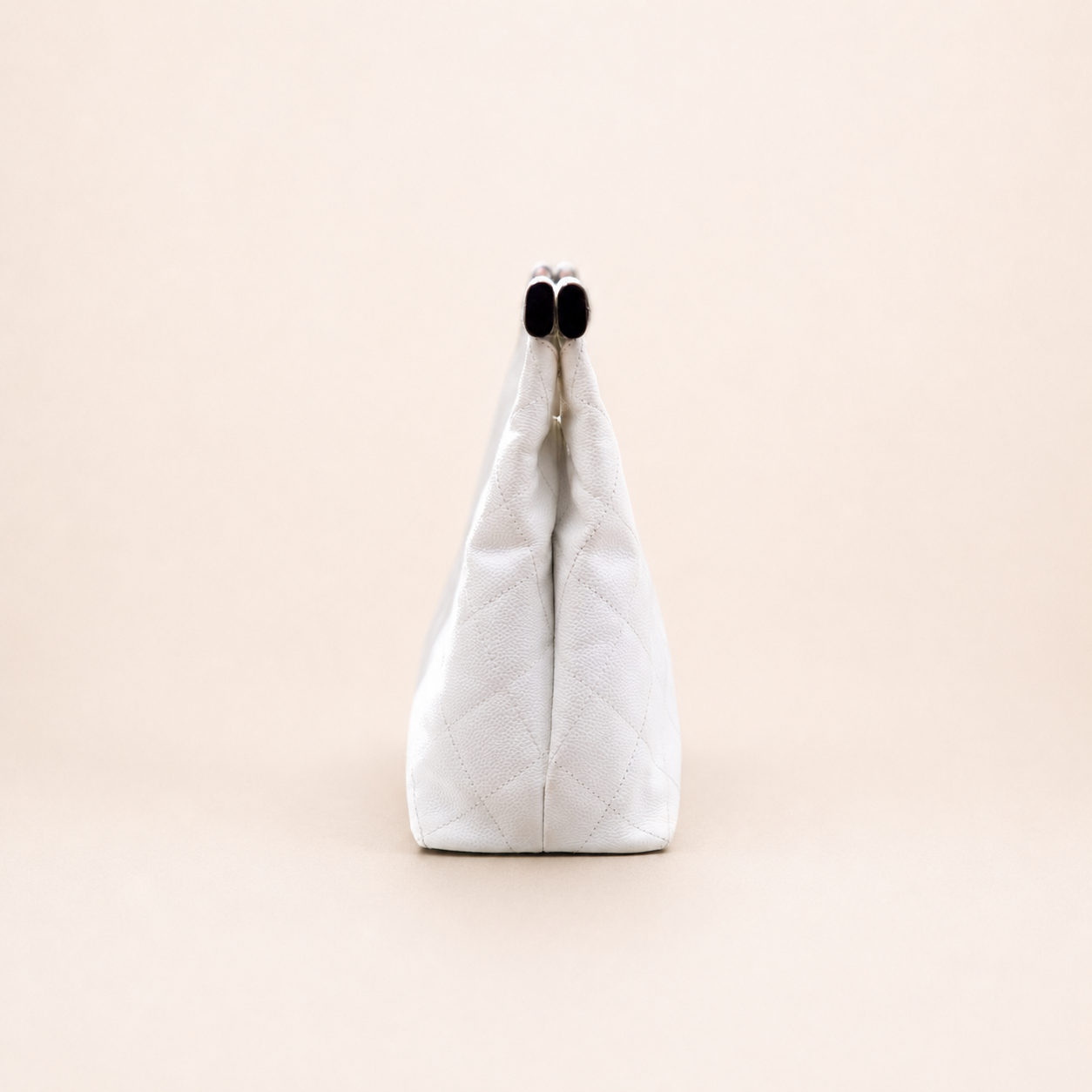 Rare authentic Chanel White Caviar Leather Wood Handle Bag with Matelassé quilting and gold-tone CC logo.
