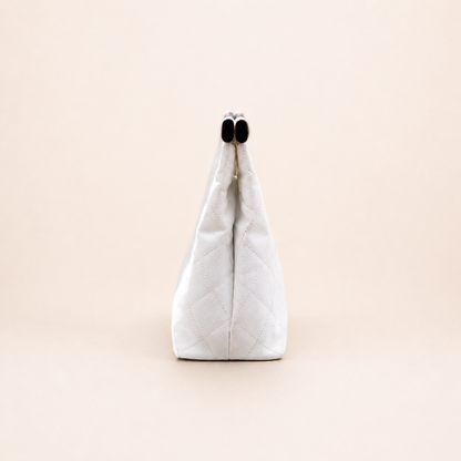 Rare authentic Chanel White Caviar Leather Wood Handle Bag with Matelassé quilting and gold-tone CC logo.