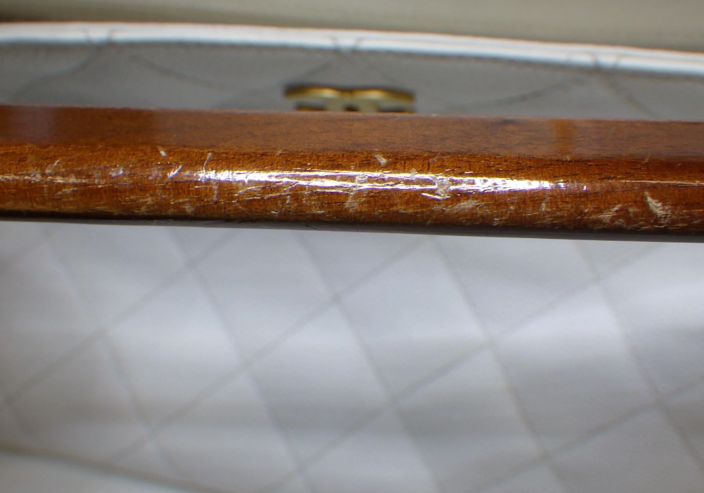 Rare authentic Chanel White Caviar Leather Wood Handle Bag with Matelassé quilting and gold-tone CC logo.