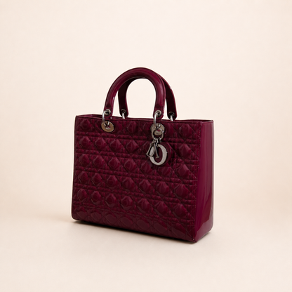 Authentic vintage Dior Lady Dior Large handbag in red patent leather with silver-tone hardware, front view