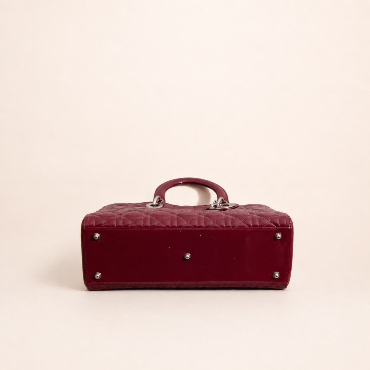 Authentic vintage Dior Lady Dior Large handbag in red patent leather with silver-tone hardware, front view
