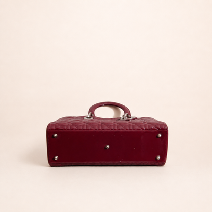 Authentic vintage Dior Lady Dior Large handbag in red patent leather with silver-tone hardware, front view
