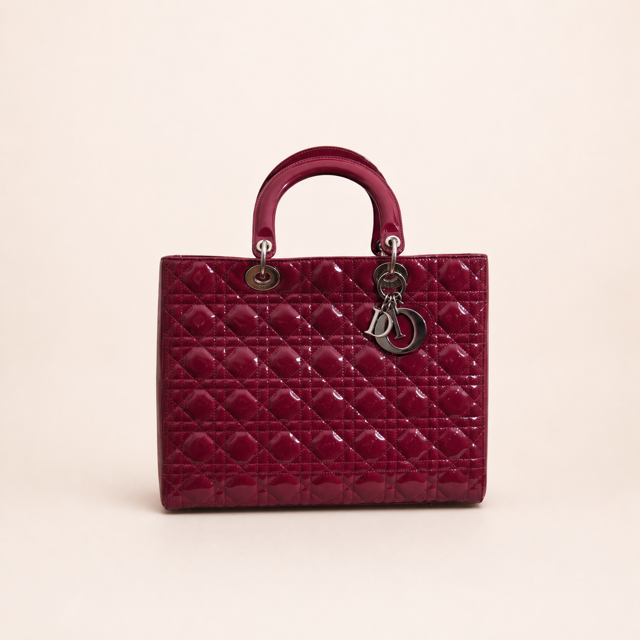 Authentic vintage Dior Lady Dior Large handbag in red patent leather with silver-tone hardware, front view