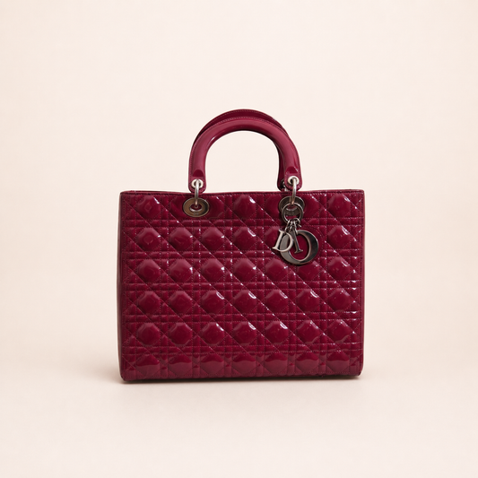 Authentic vintage Dior Lady Dior Large handbag in red patent leather with silver-tone hardware, front view