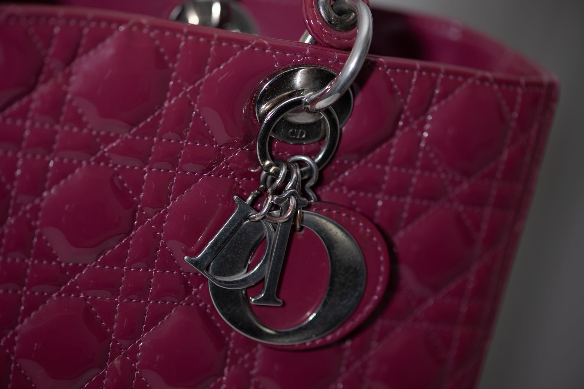 Authentic vintage Dior Lady Dior Large handbag in red patent leather with silver-tone hardware, front view