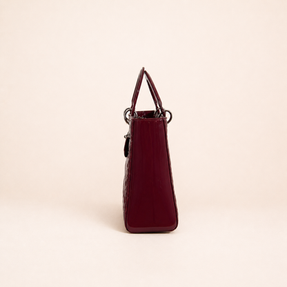 Authentic vintage Dior Lady Dior Large handbag in red patent leather with silver-tone hardware, front view