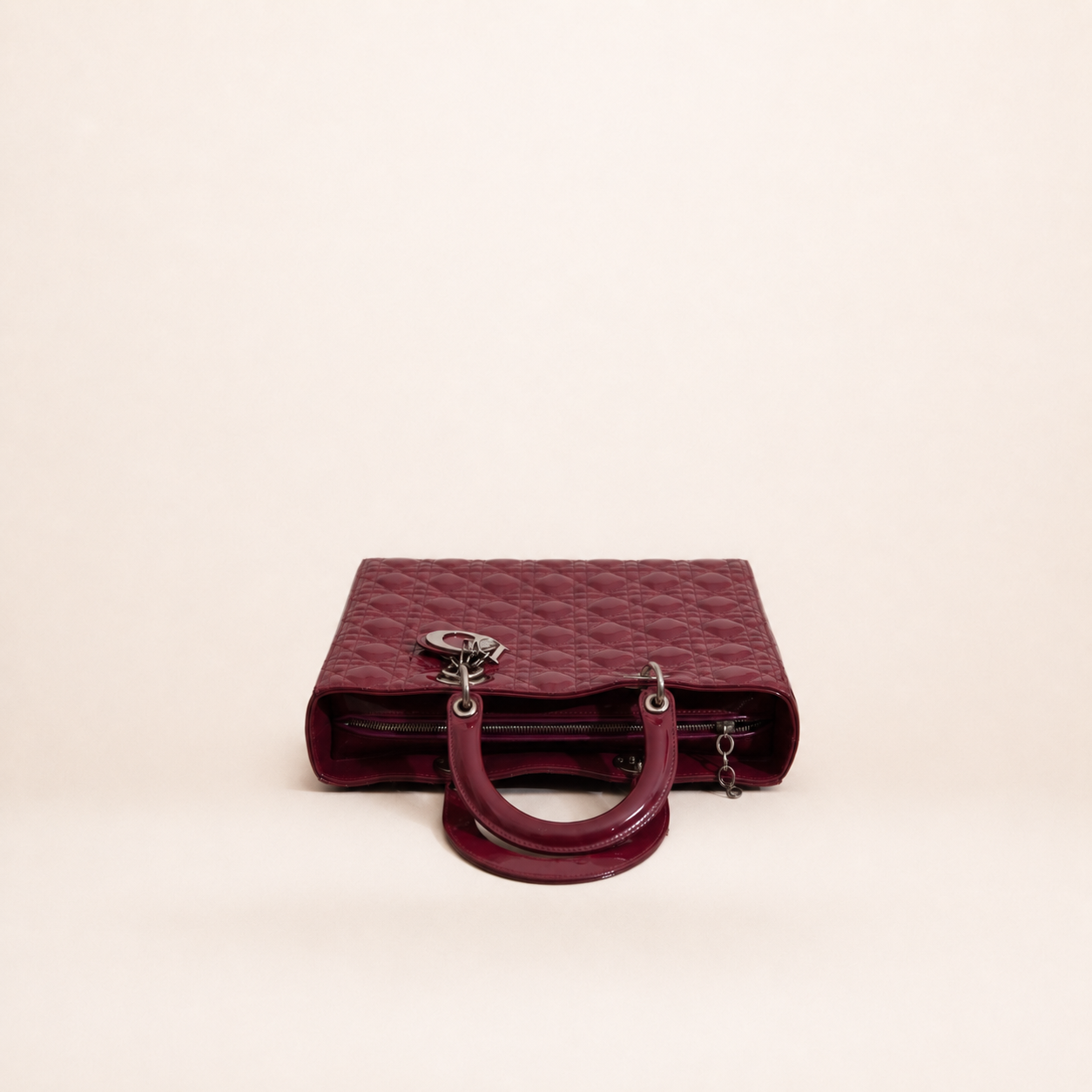 Authentic vintage Dior Lady Dior Large handbag in red patent leather with silver-tone hardware, front view
