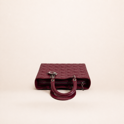 Authentic vintage Dior Lady Dior Large handbag in red patent leather with silver-tone hardware, front view